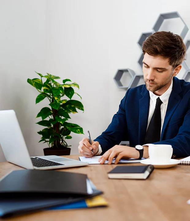 Business Accounting Services Springvale Business accountant discussing financial reports with a local business owner.